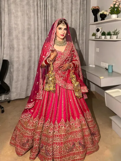 A full-length view of this ethereal bride in her stunning pink lehenga. My goal is to create a look that is not just beautiful up close but also breathtaking from afar.