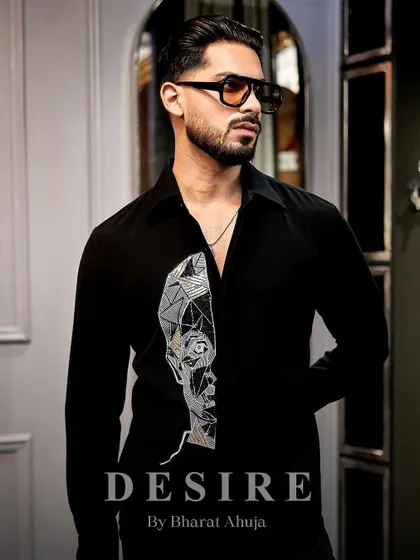 Sleek, sculpted, statement. This shirt is where art meets attitude, with every thread crafted to perfection.