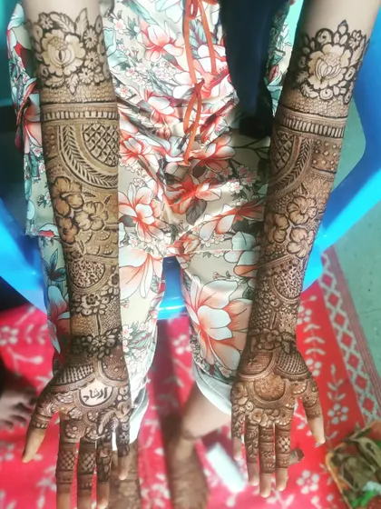 The same beautiful bridal design as ID 79, shown from a slightly different angle to highlight the full arm coverage.