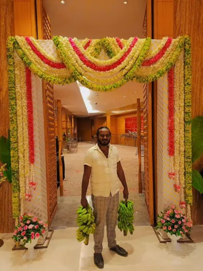 A photo of me at a wedding event. I am always on-site to ensure that every decoration is perfect and the client is happy.