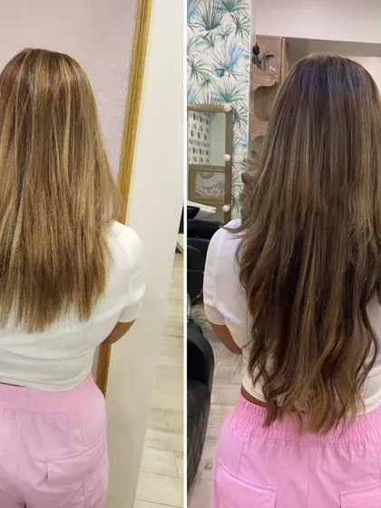 We added extensions with subtle highlights to this client's hair, giving it more dimension, volume, and a gentle wave.
