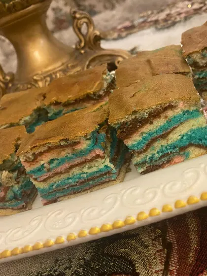 Another look at my super moist ribbon cake. The colorful layers make it a fun and delicious choice for both kids and adults.