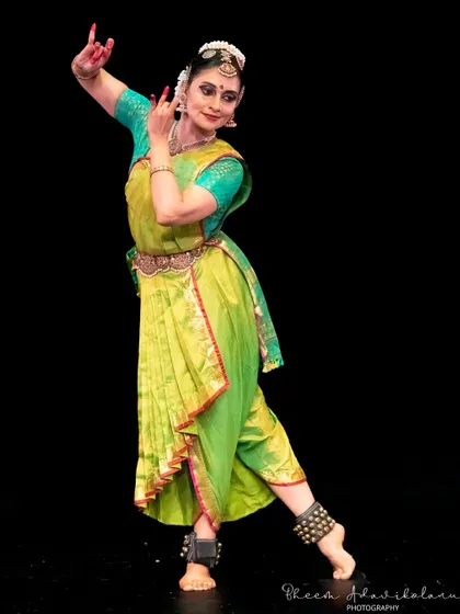 A classic Bharatanatyam pose from a performance in London, highlighting the form's timeless beauty.