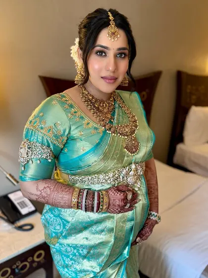 A beautiful portrait in her hotel room before the event. The makeup is fresh and dewy, making her look and feel like a queen for her baby shower.