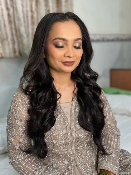 A close-up of the soft and glamorous reception makeup.