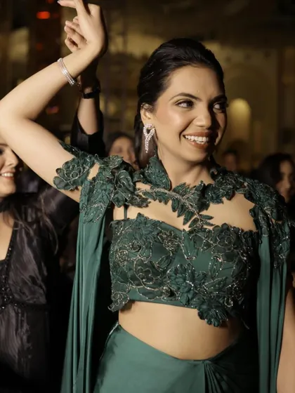 A close-up of the intricate lacework and beading on the shoulder of the gown. It’s these beautiful details that elevate a look from simple to stunning.
