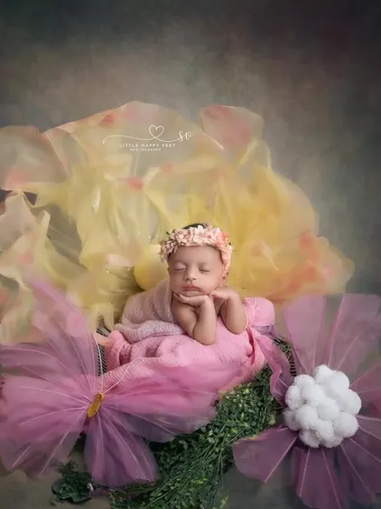 A whimsical, oversized flower setup. The abstract shapes and colors create a fantasy garden for this little one to dream in.