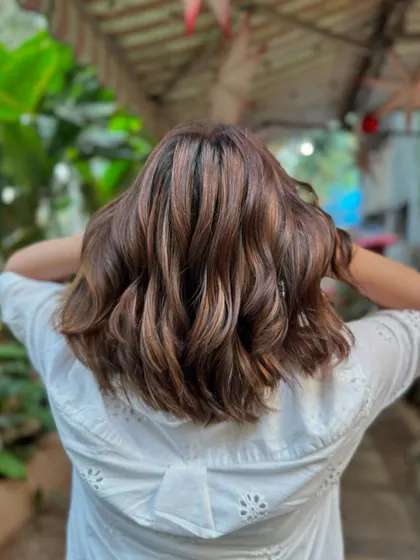 A final shot of this fabulous brown sugar balayage. The color is rich, and the cut is super chic. (No filter)