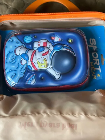 I can include themed items like this astronaut pencil case to match a child's interests.