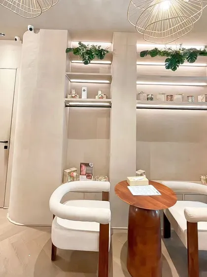 Our cozy waiting corner, a perfect spot to gather your thoughts before a session or relax after. Every detail is curated for your comfort.