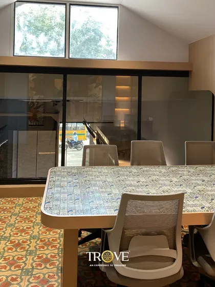 This meeting space in my Whitefield showroom features a beautiful patterned tile on both the floor and the tabletop. It’s a great example of how you can use the same tile in different applications to create a cohesive, designer look.