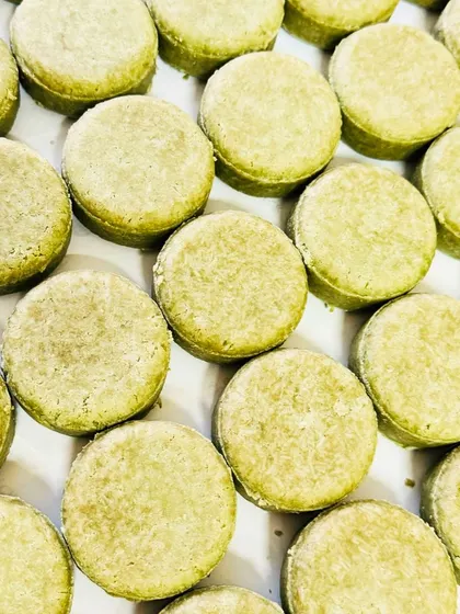 A fresh batch of our Moringa, Rosemary & Peppermint Shampoo Bars, ready to go. These green bars are packed with moringa powder and essential oils known for their ability to soothe the scalp and reduce dandruff.