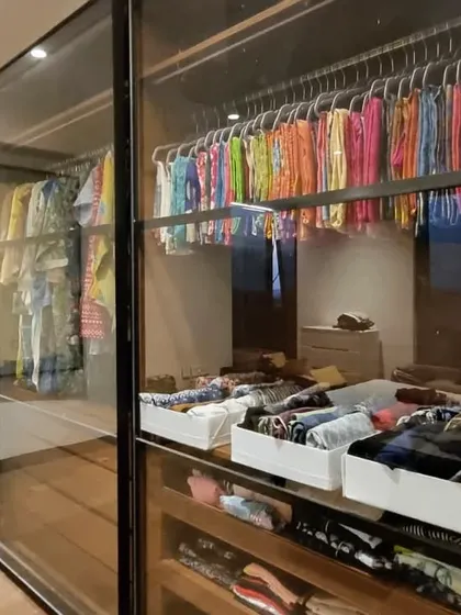 This client wanted her transparent wardrobe doors to reveal a space that was both beautiful and maintainable. By using file-folding in uniform baskets and color-coordinating hung clothes, we created a functional work of art.