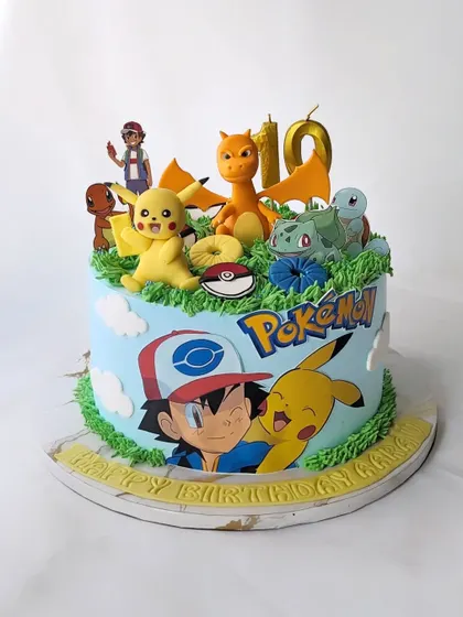Gotta catch 'em all! This Pokemon cake is perfect for a 10th birthday, featuring Pikachu, Charizard, and other favorite characters ready for battle.