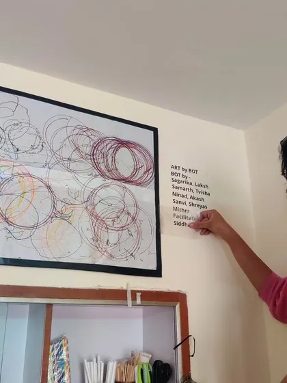 The walls of our lab are adorned with creations from our workshop participants. This large piece of art was made by the doodle bots from one of our electronics workshops.