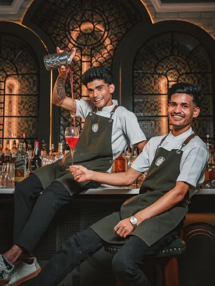 Meet the alchemists behind my bar. They don't just pour drinks; they craft joy, one artisanal cocktail at a time. Their energy and skill are a key part of any celebration at the mansion.