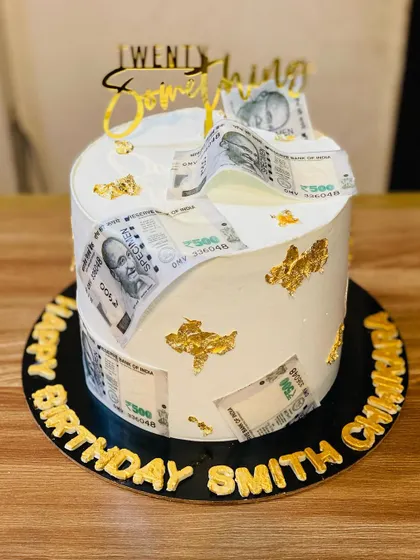 Add a fun surprise to your celebration with a money-pulling cake. This one features edible currency notes hidden inside, making for an exciting reveal. It's a great way to make birthdays and special announcements even more memorable.