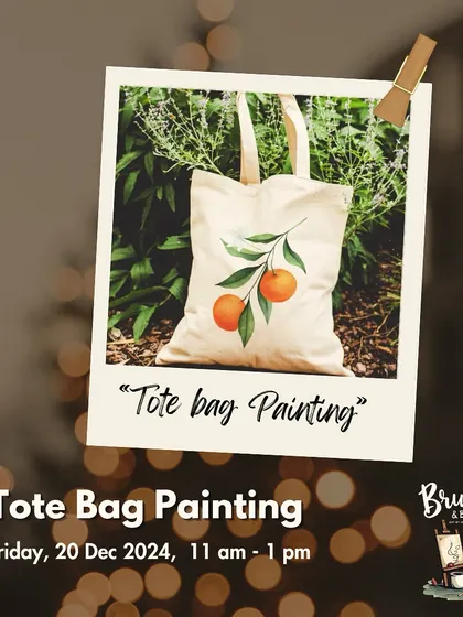 An announcement for our tote bag painting workshop, where you can create wearable art like this lovely orange branch design.