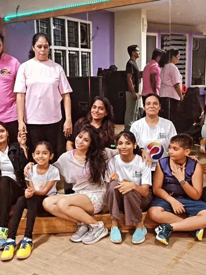 A series of group photos from our Women's Day celebration. So much love and positive energy in one room.