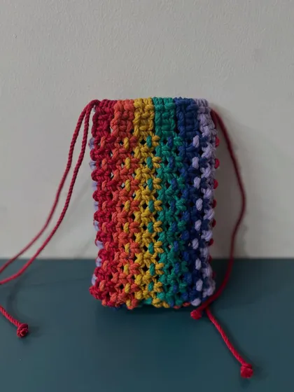 The rainbow pouch is coming along nicely. It's a fun and vibrant accessory that's perfect for pride month or just for lovers of color.