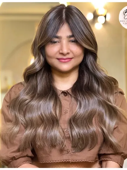 A final shot of the stunning ash blonde transformation, a perfect blend of bold and bright.
