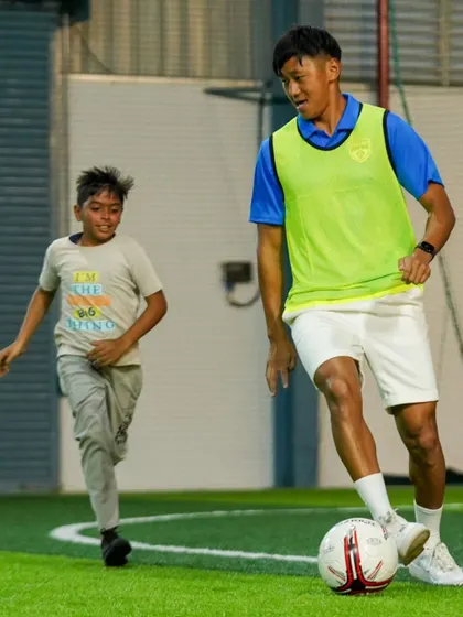 BFC players Shivaldo Singh and Namgyal Bhutia enjoy a kickabout with kids at the BFC Soccer Schools Grassroots Festival.