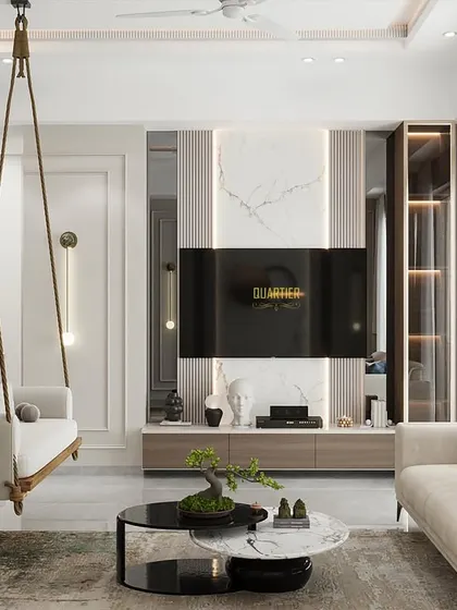 This render for the Apex D'Rio project shows how a swing can be integrated into a formal living area. The TV unit features a marble-look backdrop and is flanked by display shelves, combining entertainment with elegant display.