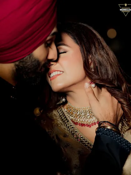A glamorous close-up from an evening engagement event. The lighting is designed to highlight her joyful expression and the intricate jewelry, creating a portrait that is both intimate and incredibly elegant.
