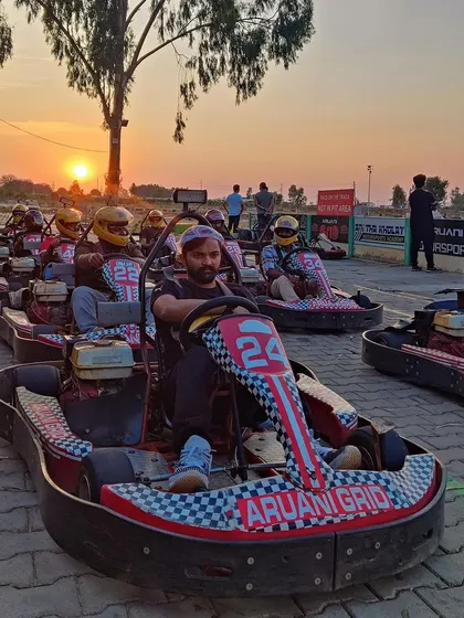 A beautiful sunset view from the pit lane as a group gets ready for their session. It's the perfect way to end the day with your crew.