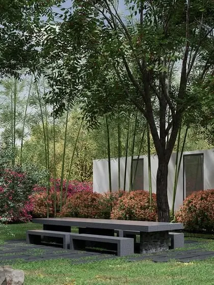The architecture of this weekend retreat is designed to be a quiet backdrop to the landscape. The solid, textured walls of the building contrast with the soft, dense foliage, creating a private sanctuary where the focus is on the beauty of the natural surroundings.