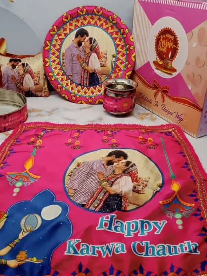 Celebrate Karwa Chauth with our fully personalized thali set. It includes a thali, cover, lota, chalni, and a small cushion, all printed with your couple photo.