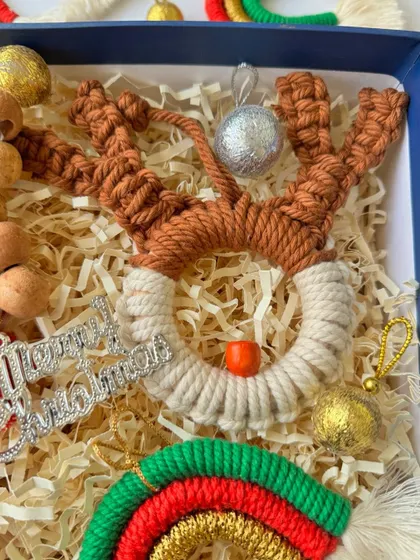 The adorable macrame reindeer ornament from the curated Christmas gift box.