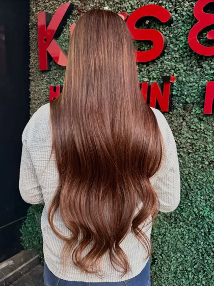 A back view of this stunning brunette bridal look, showing off the length and the richness of the color.