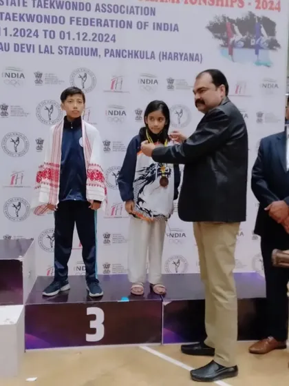 The official medal ceremony at the sub-junior nationals. Naysha receiving her hard-earned bronze medal.