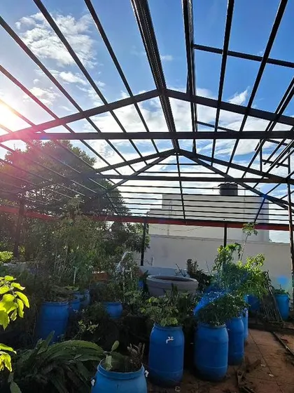 A look at the new truss work on our terrace. This structure will support solar panels and a new roof for rainwater collection, helping us become more self-sufficient.