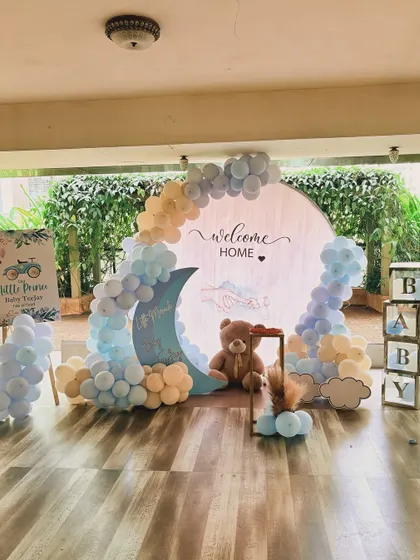Welcoming a new baby home is such a precious moment. I created this sweet and serene "Welcome Home" setup with a teddy bear and moon theme, using a soft pastel blue and yellow color palette.