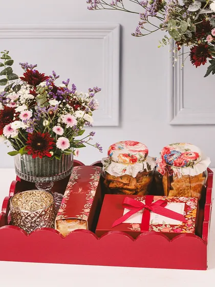 Our small Imperial Tray, beautifully arranged with fresh flowers, jars of handcrafted cookies, and a box of sweets. A perfect, ready-to-gift option for Diwali.