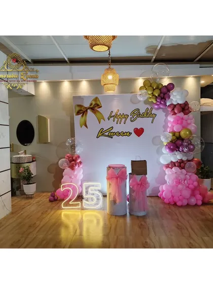 A wide view of the 25th birthday decoration, showing how it fits into the venue space.