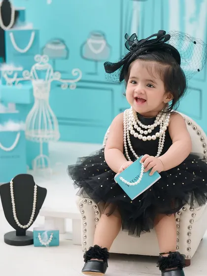 Breakfast at Tiffany's, baby style. This glamorous and chic setup is one of our most unique themes, perfect for a little fashionista.
