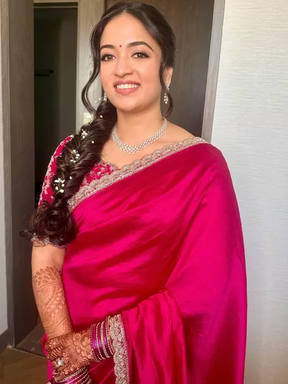A happy, smiling portrait that radiates warmth and elegance.
