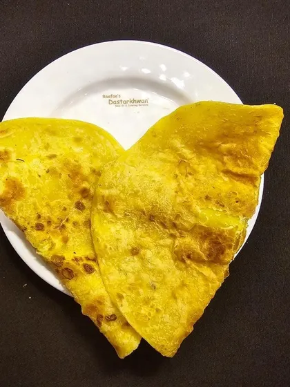 The perfect partner for my gravies and kebabs, the Nawabi paratha. It's soft, flaky, and has a rich flavour that complements all my Mughlai dishes.