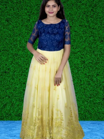 A two-toned lehenga with a navy blue lace top and a light yellow embroidered skirt. This color combination is both elegant and eye-catching.