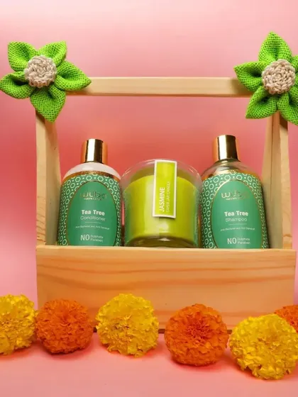 A clean, centered shot of the hair care products in a wooden caddy, perfect for a primary product photo.