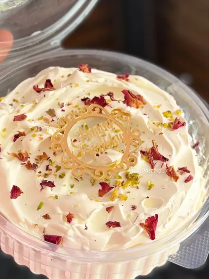 My XXL Tres Leches tub cake is perfect for sharing. It's a super moist, milky cake topped with whipped cream, pistachios, and dried rose petals.