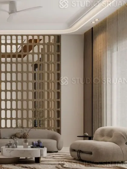 Another angle of the Model Town lobby, showing the comfortable, modern seating and the effective use of a large, patterned rug to define the space.