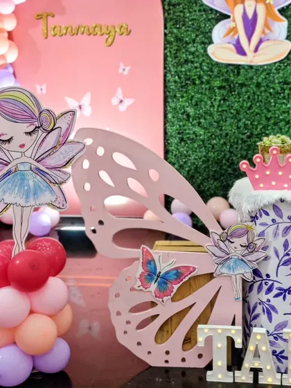 A close-up of the fairy and butterfly props.
