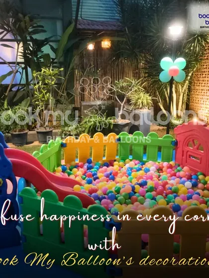 This image of a colorful ball pit and play area shows how we infuse happiness in every corner. Our services go beyond balloons to include fun activities for kids.