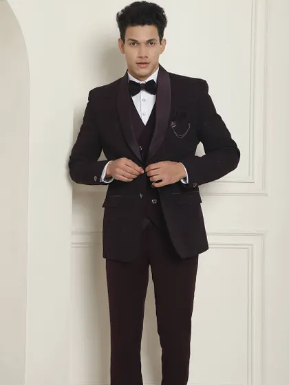 A full-length shot of our wine-colored tuxedo, showing its impeccable fit and modern design.