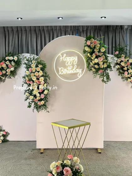 My 50th birthday decorations are designed to be tasteful and celebratory. I offer both floral-heavy designs and modern balloon arrangements to honor this golden milestone.