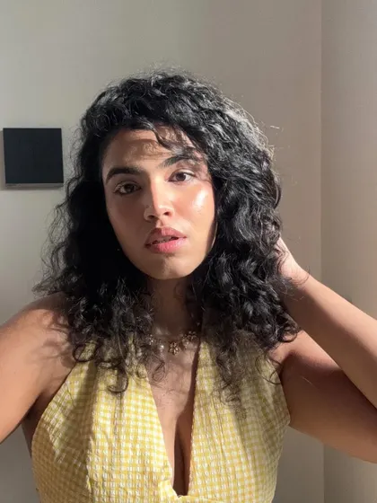 A sun-kissed selfie, with the light hitting my face perfectly. This shot is all about that golden hour glow.